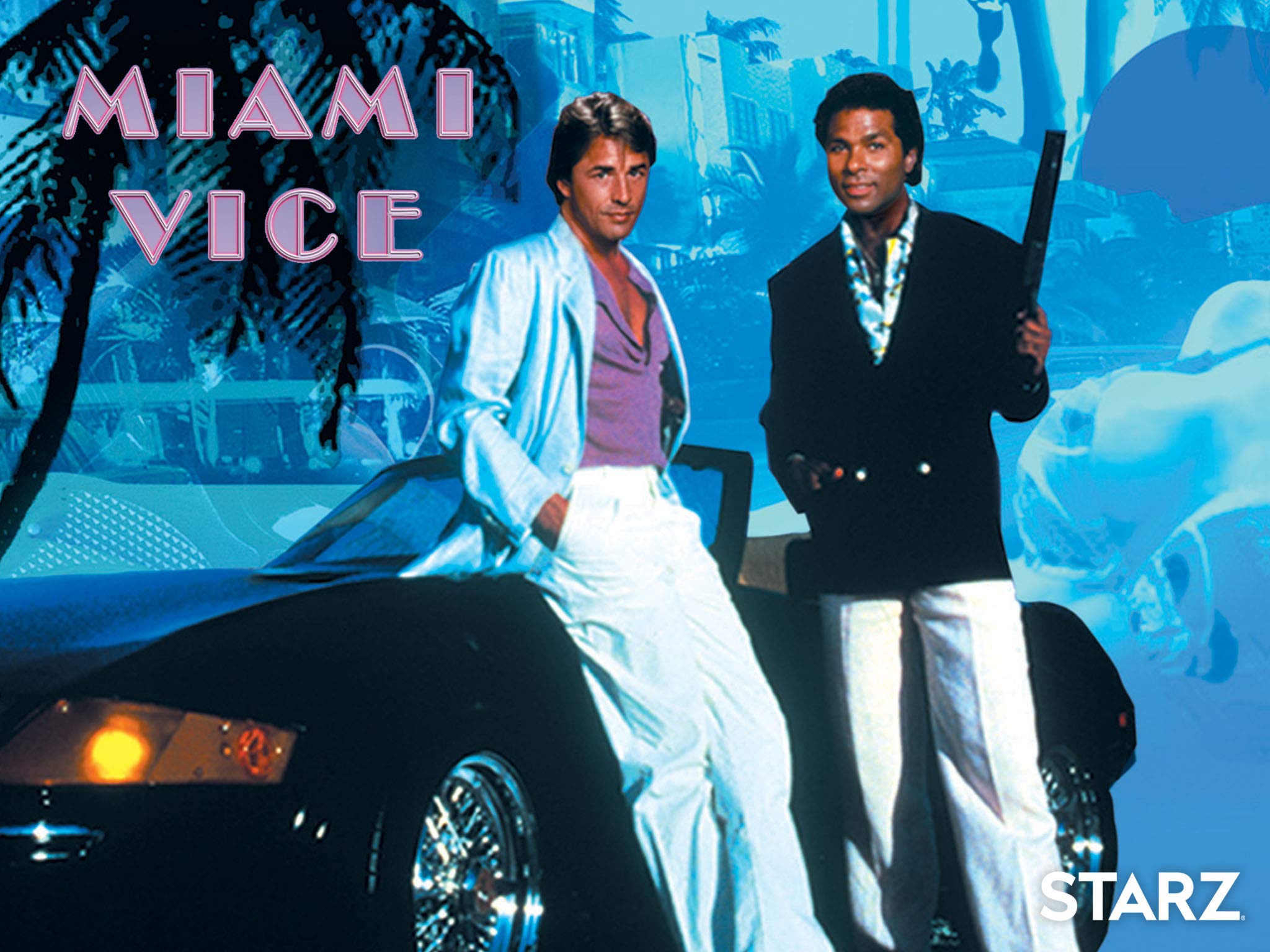 The font, the car, the cut of those trousers - there’s a… style to it. Who’d have thought the process of making Miami Vice would be so useful in creating theatre. Pic shows two men, one white and one African-American, in 70s clothes leaning on a sports car.